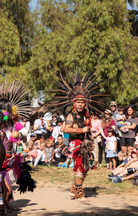 People in traditional clothing during festival