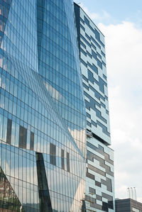 Low angle view of modern buildings against sky