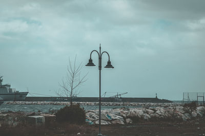 Windmills against sky