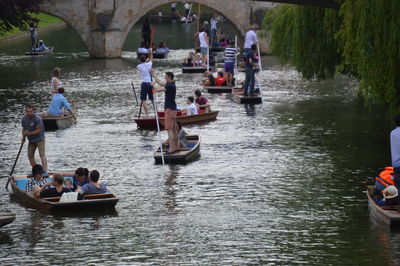 People on boat in river
