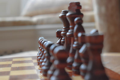 Close-up of chess pieces on chess board