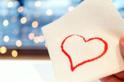 Close-up of heart shape on tissue paper