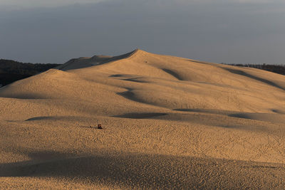 Scenic view of desert against sky