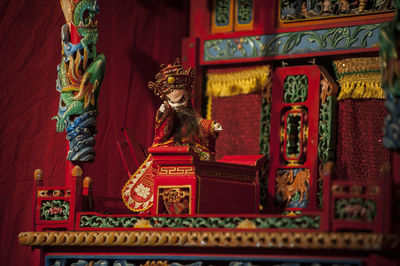 Statue in temple outside building