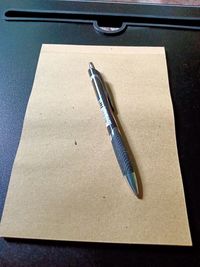 High angle view of pen on table