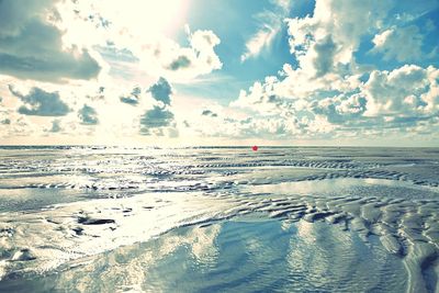 Scenic view of sea against sky during winter