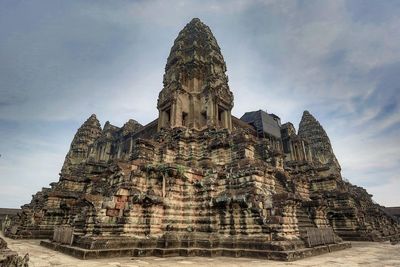 Low angle view of statue of temple