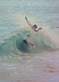 Man surfing in sea