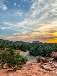 Scenic view of beach against sky during sunset