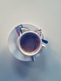 Close-up of coffee cup on table