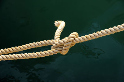 Close-up of rope knot tied on boat