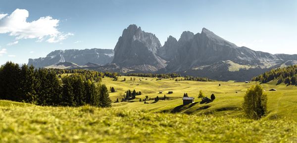 Scenic view of landscape and mountains against sky