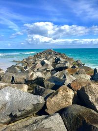 Scenic view of sea against blue sky