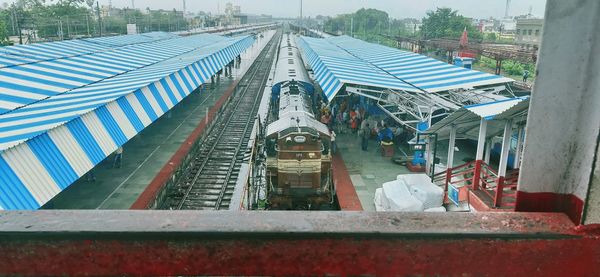 High angle view of train on railroad tracks in city