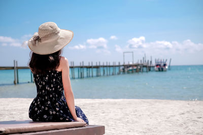 Woman sitting on beach