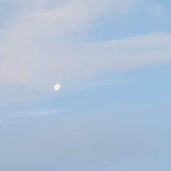 Low angle view of moon in sky