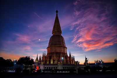 View of temple building against sky during sunset
