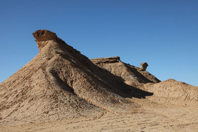 Ong jemal against clear blue sky at desert