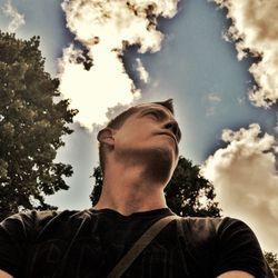 Low angle view of man against sky