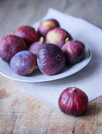 Close-up of fruits in plate on table