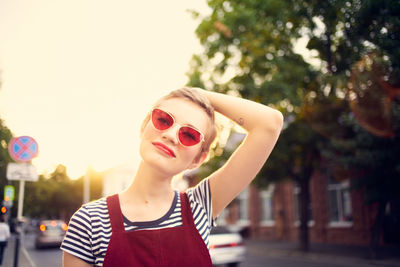 Portrait of beautiful woman in city