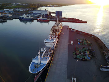 High angle view of boats moored at harbor