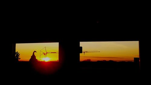 Silhouette man against orange sky during sunset