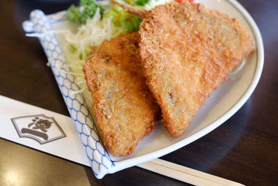 High angle view of serving food in plate on table