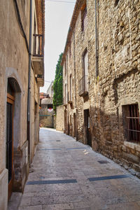 Narrow alley along buildings