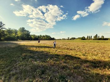 Scenic view of field against sky