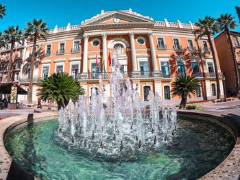 Fountain in front of building