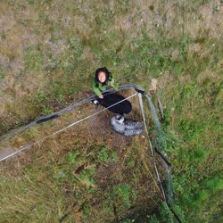 High angle view of man standing in water