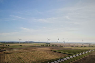 Windmill turbines in countryside. sustainable wind energy concept
