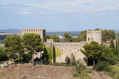 Panoramic view of building against sky in toledo, spain.