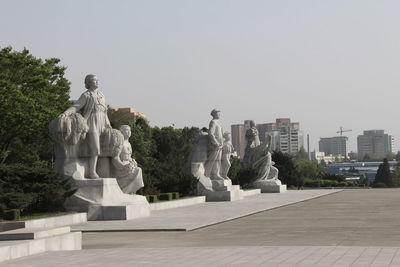 Statue in park against clear sky