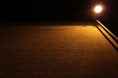 Illuminated street lights at night