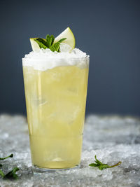 Close-up of drink glass on ice