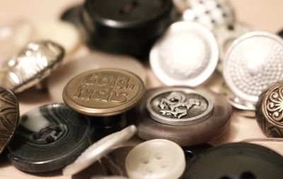 Close-up of coins on table