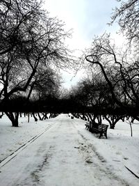 Scenic view of snow covered landscape against sky