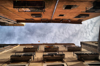 Low angle view of buildings against sky