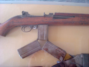 Close-up of old machine part on wooden table