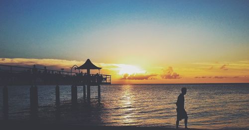 Scenic view of sea at sunset