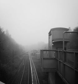 Railroad track in foggy weather