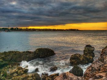 Scenic view of sea against sky during sunset