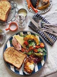 High angle view of breakfast served on table