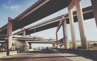 Bridge over road in city