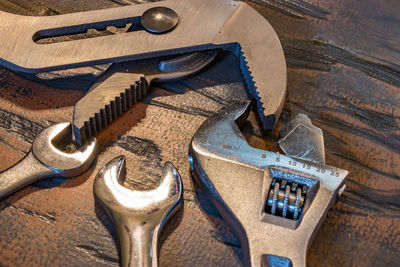 Directly above shot of work tools on wooden table