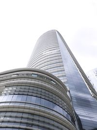 Low angle view of skyscraper against clear sky