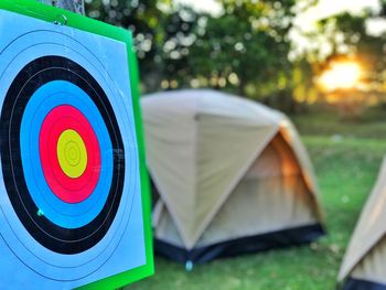 Sports target on field against tent