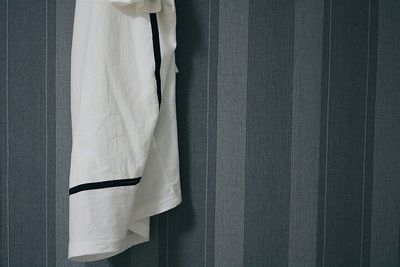 Close-up of clothes hanging on fabric